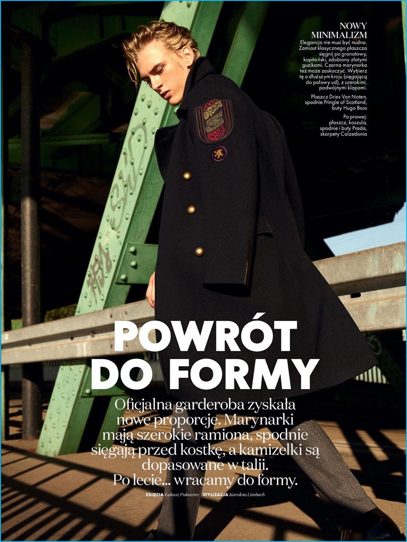 Making a military style statement, Dominik Sadoch dons a Dries Van Noten officer coat with Pringle of Scotland trousers.