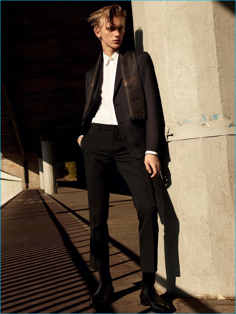 Model Dominik Sadoch dons a formal look from Ermenegildo Zegna Couture with Dior Homme trousers.