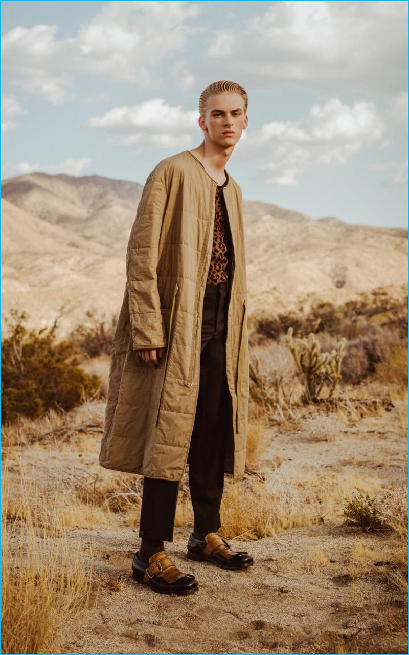 Ben Grieme photographs Dominik Sadoch in Pringle of Scotland trousers, Prada leather shoes, as well as a Loewe quilted coat and leopard print tank.
