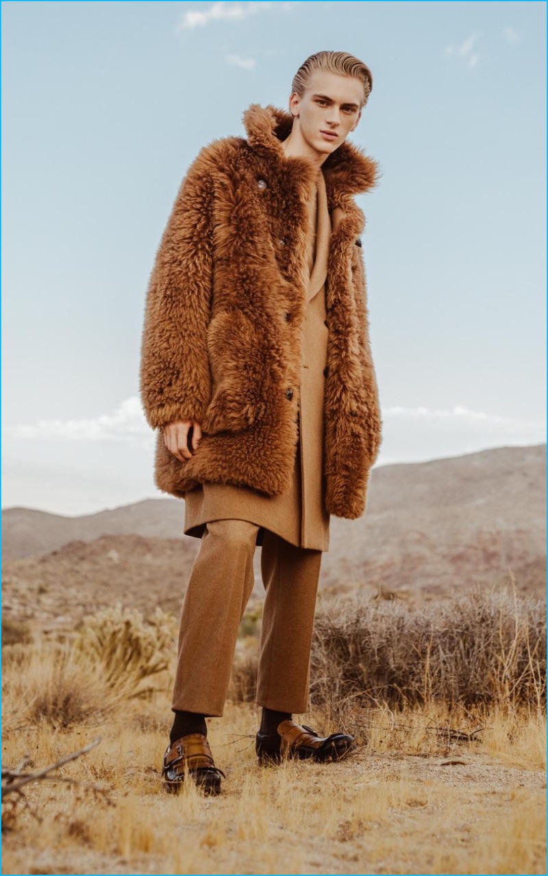 Dominik Sadoch steps out in a Coach shearling coat with Prada leather shoes, an Ami wool coat and trousers for The Telegraph.
