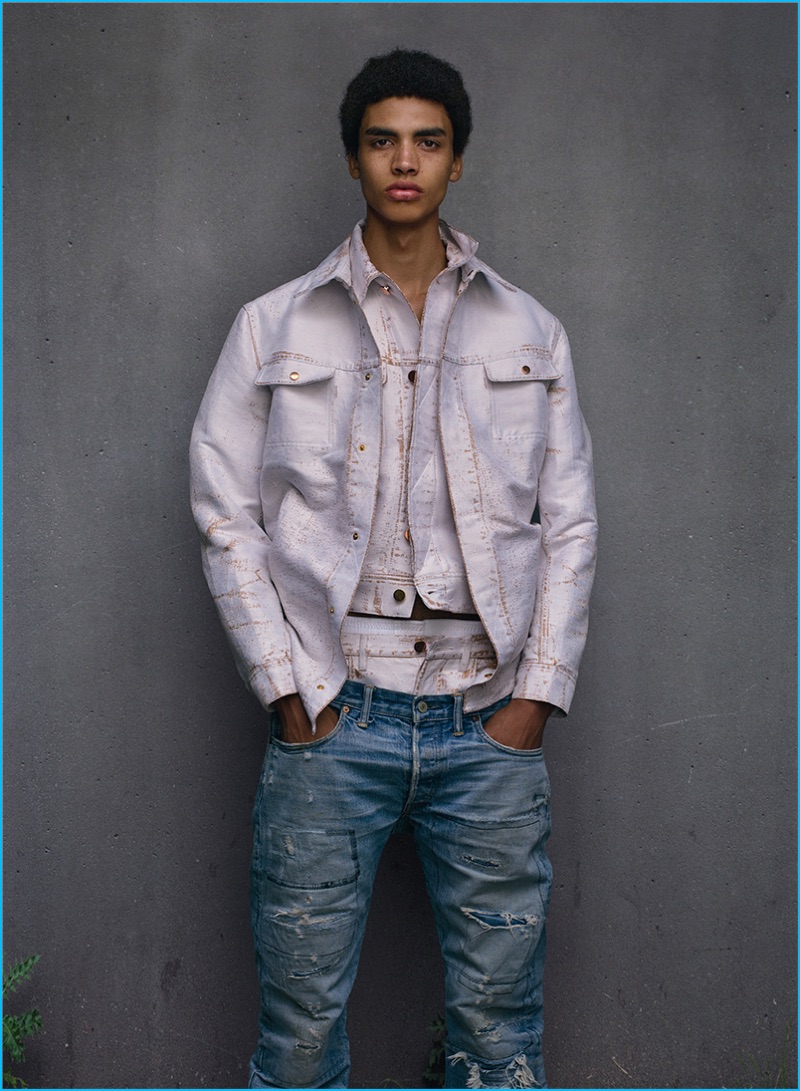 Front and center, Sol Goss sports a look from Calvin Klein Collection with RRL Ralph Lauren denim jeans.