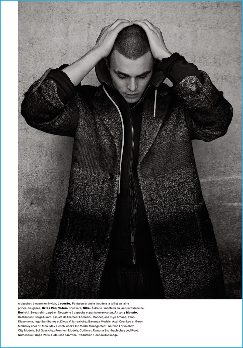 A moody image, Diego Villarreal wears a Berluti coat with a jacket and pants from Antony Morato.