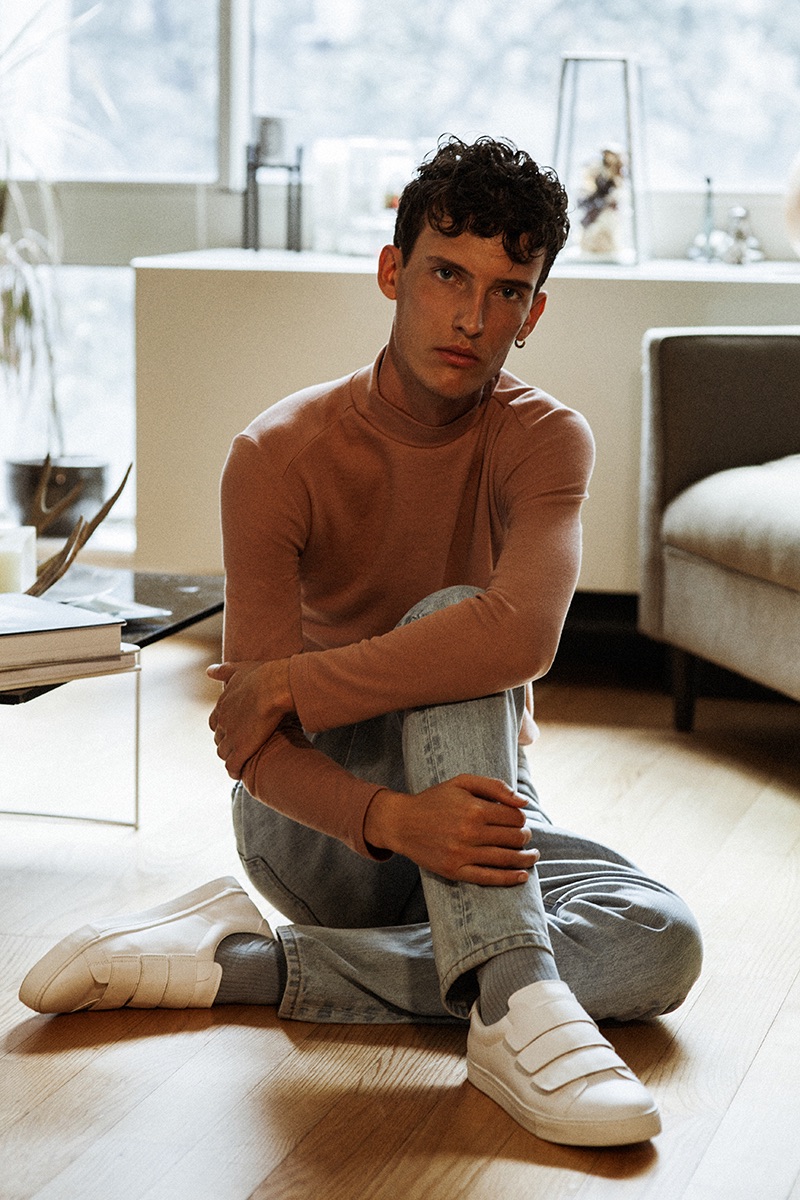 Front and center, Dzhovani Gospodinov models a mock turtleneck from Zara with Steven Alan denim jeans.