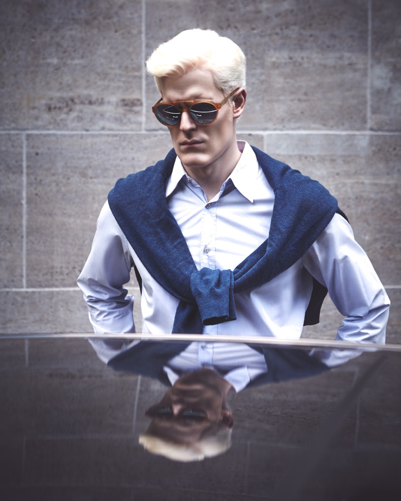 Model Stephen Thompson sports a Jil Sander shirt, Maison, and IC Berlin sunglasses.