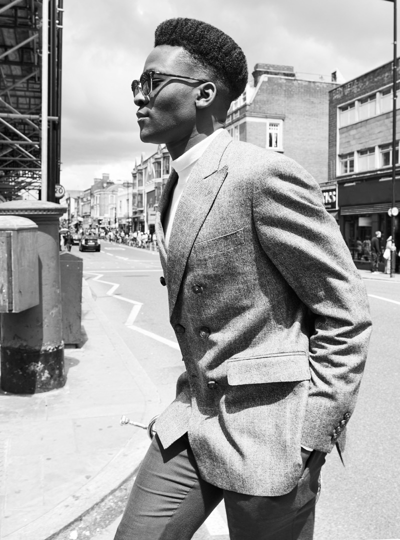 Rahim wears shirt Topman, sunglasses Ray-Ban, shoes Base London, jacket and trousers Holland Esquire.