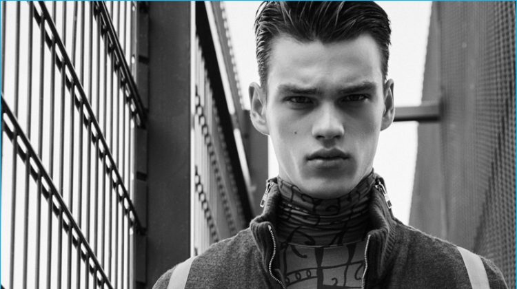 Filip Hrivnak Dons Graphic Fashions for L’Officiel Hommes