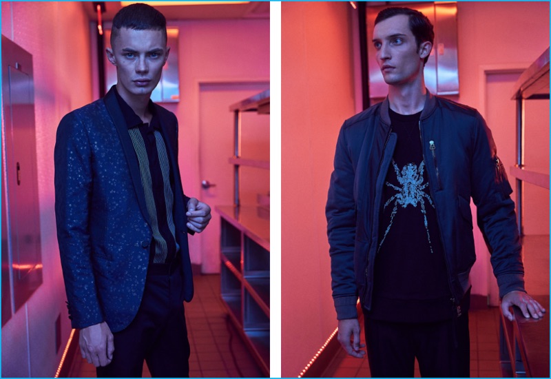Left to Right: Going formal, Simon Kotyk dons a slim fit shawl collar jacket, embroidered jacket shirt, trousers, and leather Chelsea boots from Lanvin. Wearing more fashions from the Parisian fashion house, Max Von Isser models a patchwork satin bomber jacket, spider embroidery sweatshirt, pleated trousers, and waxed calfskin derbies.