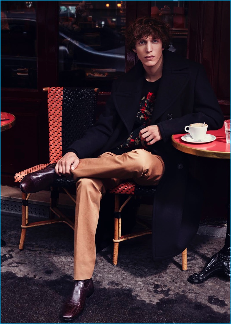 James Sleaford outfits Xavier Buestel in a coat and trousers from Hermes. Xavier stays warm in a Tiger of Sweden sweater and Pete Sorensen boots.