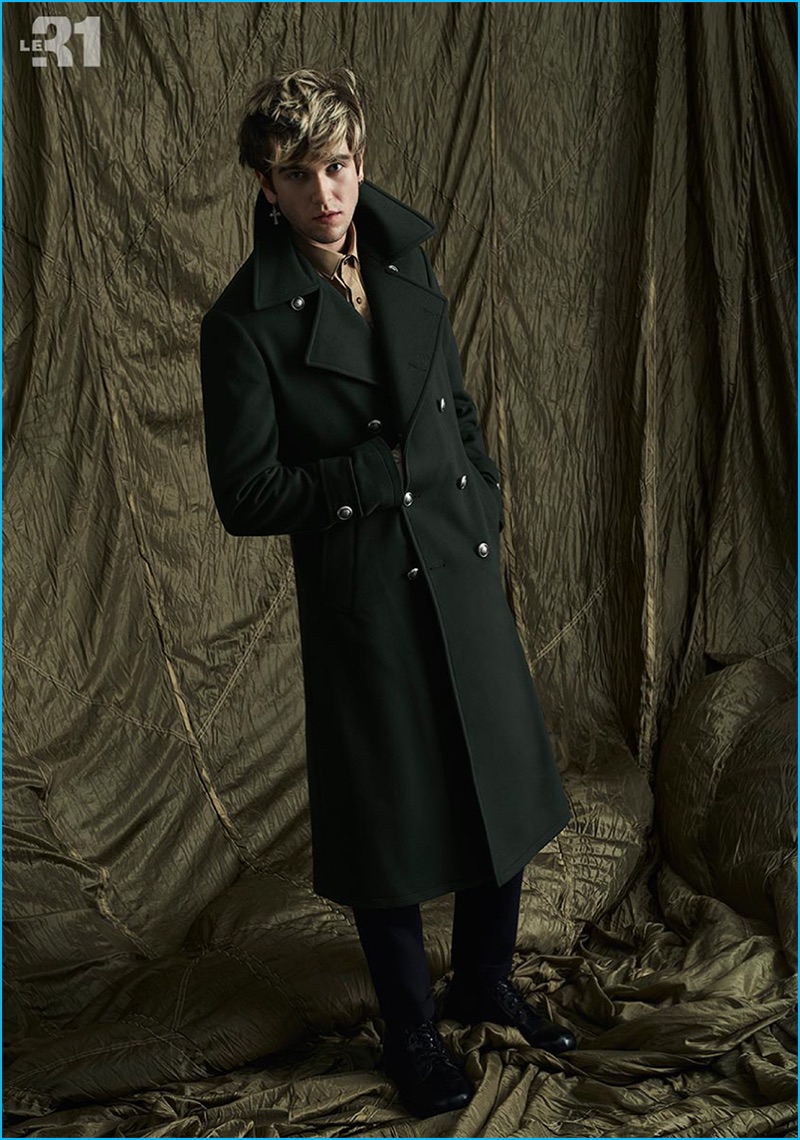 Gabriel-Kane Day-Lewis stands at attention in a LE 31 military coat, convertible collar shirt, and pleated flannel pants.