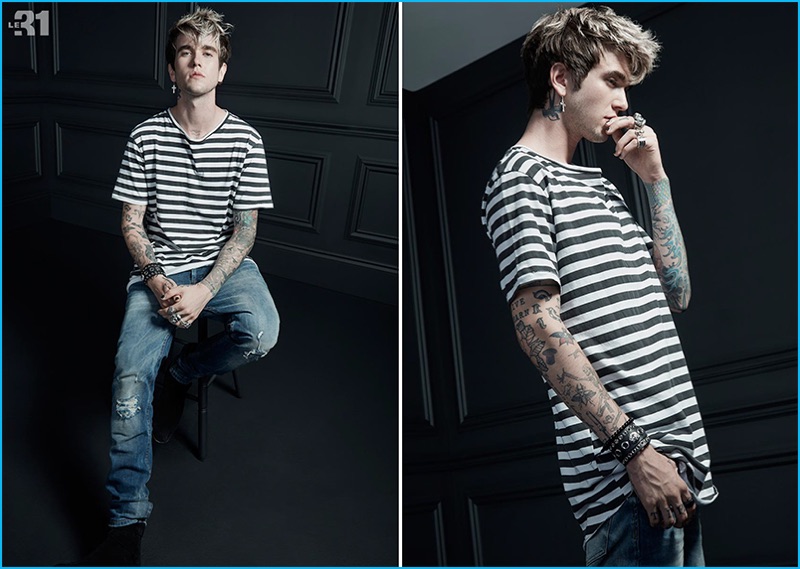 Channeling a casual attitude, Gabriel-Kane Day-Lewis models a LE 31 striped longline t-shirt with Only & Sons patched distressed slim-fit denim jeans from Simons.