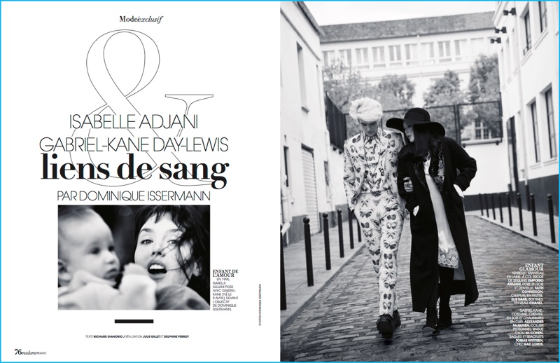 Walking outside with his mother, Isabelle Adjani, Gabriel-Kane Day-Lewis wears a butterfly print suit from Alexander McQueen for Madame Figaro.