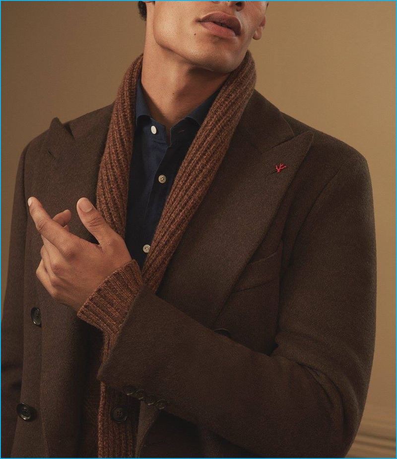 Autumnal hues are front and center with a brown wool melton double-breasted coat, polka dot cotton shirt, and wool shawl-collar cardigan from ISAIA.