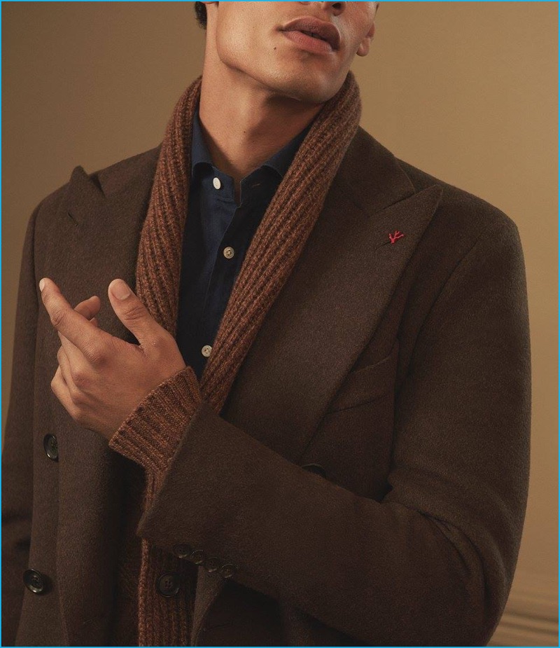 Autumnal hues are front and center with a brown wool melton double-breasted coat, polka dot cotton shirt, and wool shawl-collar cardigan from ISAIA.