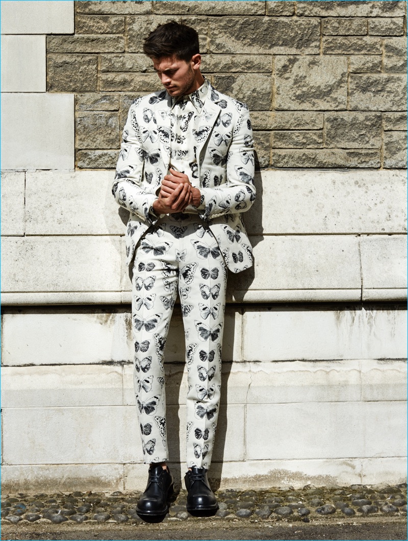 Gregory Vaughan photographs Jevan Williams in a butterfly print suit from Winq.