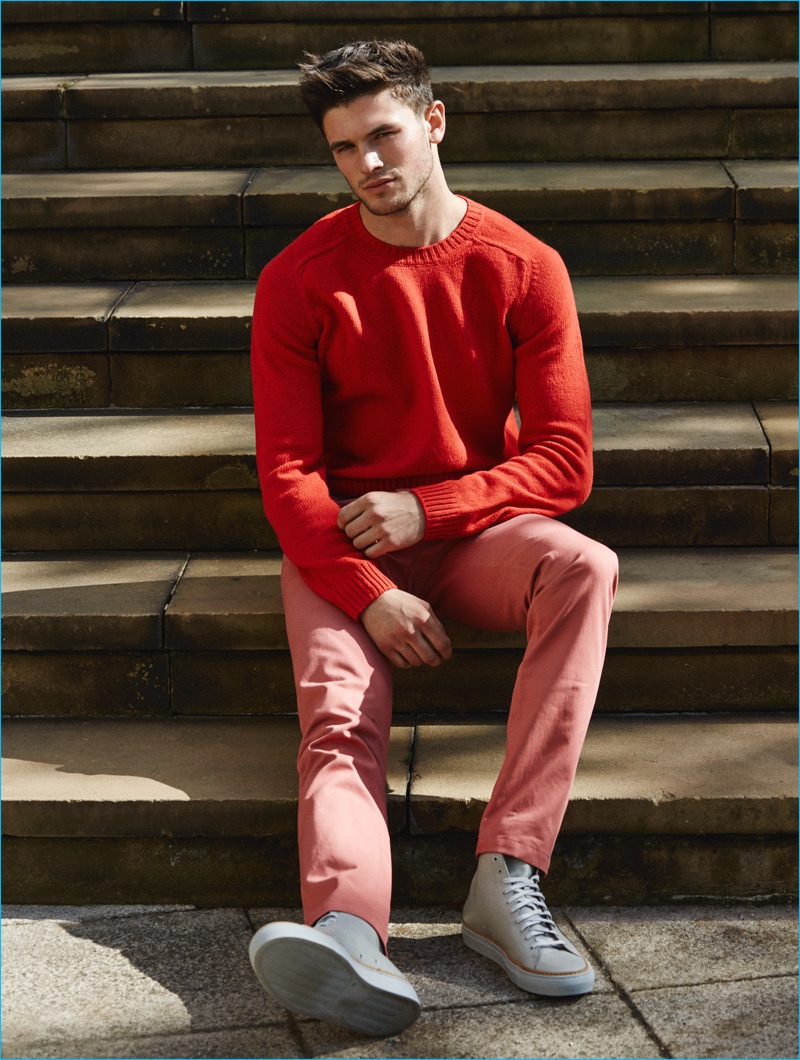 Model Jevan Williams goes casual in a pullover from Paul Smith for Winq.