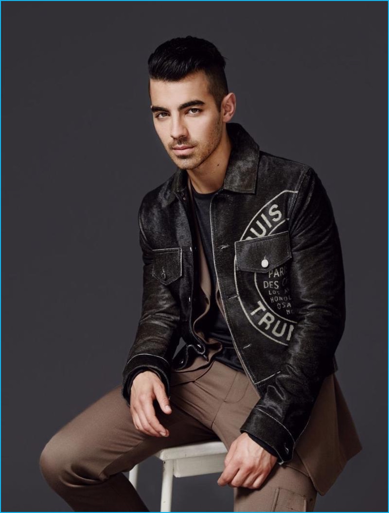 Joe Jonas wears fashions from Louis Vuitton and Dolce & Gabbana for L'Optimum Thailand.
