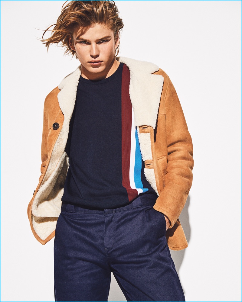 Appearing in a photo shoot for Sunday Times Style magazine, Jordan Barrett wears a Pringle of Scotland sweater. Jordan also sports a Gant shearling jacket and Dickies pants. 