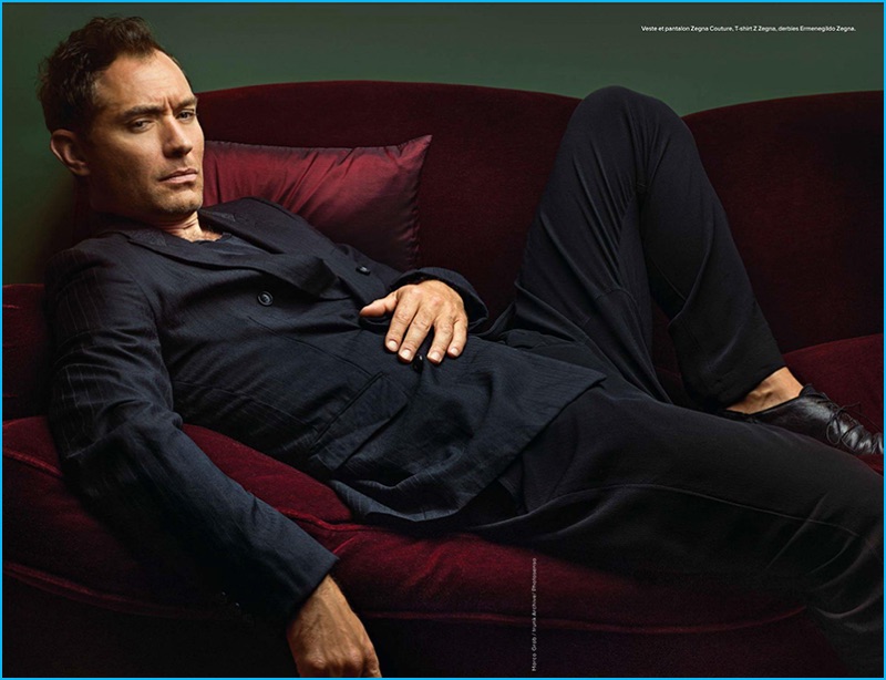 English actor Jude Law wears an Ermenegildo Zegna Couture suit with a Z Zegna t-shirt, and Ermenegildo Zegna dress shoes for GQ France.
