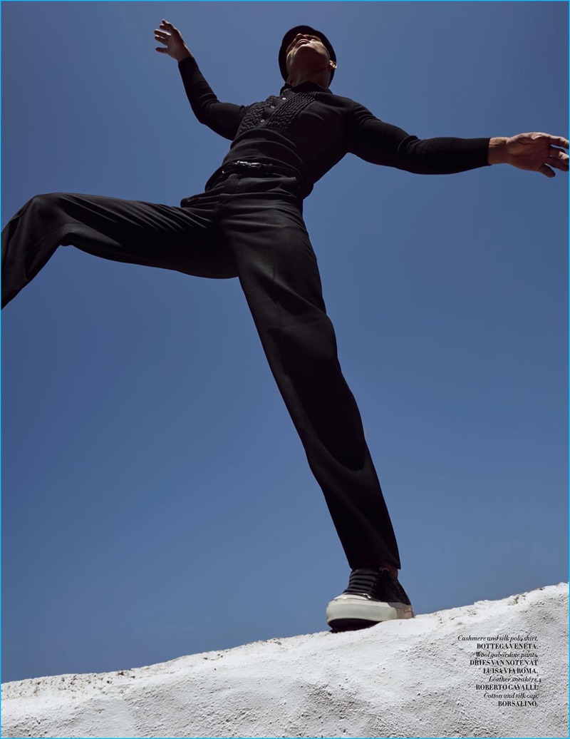 Hitting elegant lines, Julian Schneyder models a Bottega Veneta polo with Dries Van Noten trousers, and Roberto Cavalli sneakers.