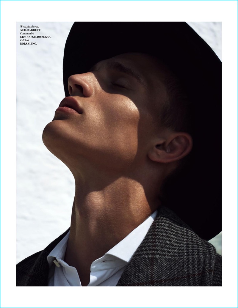 Model Julian Schneyder dons a Borsalino felt hat with a plaid Neil Barrett coat and Ermenegildo Zegna shirt for L'Officiel Hommes Singapore.