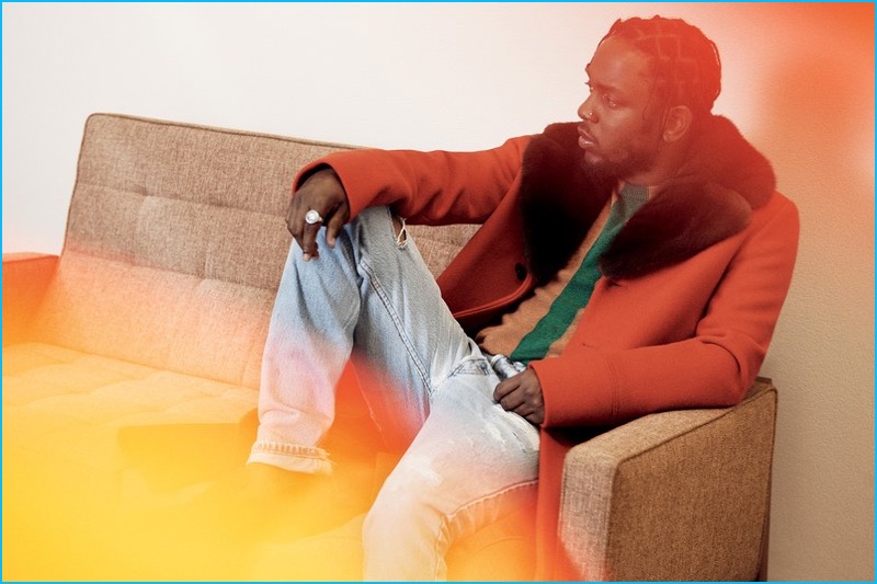 Making a color statement, Kendrick Lamar rocks an orange coat from Gucci.