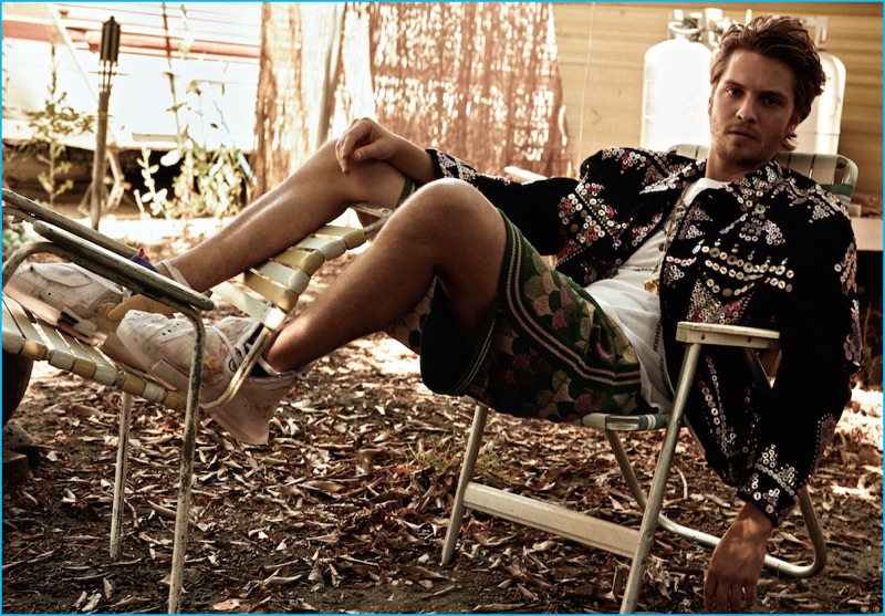 Dominick Sheldon photographs Luke Grimes in a sequined jacket and patterned shorts from Gucci with a vintage Number (N)ine t-shirt for Interview magazine.