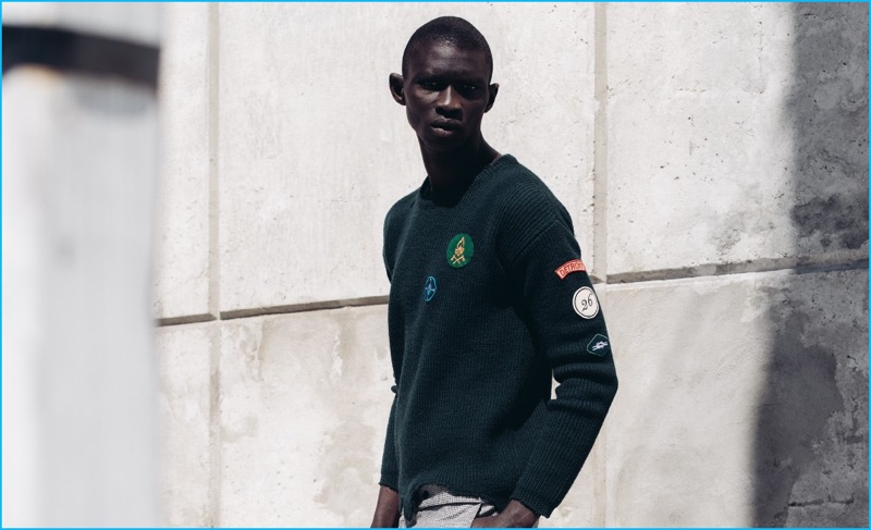 Geordie Wood photographs Fernando Cabral in a Raf Simons ribbed wool sweater with straight-leg trousers from Lemaire.