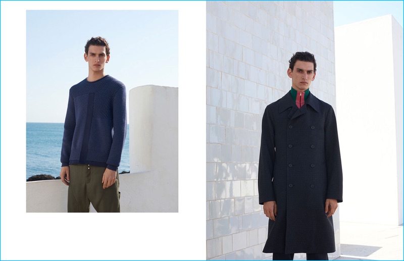 Left to Right: Thibaud Charon dons a blue sweater and green trousers from OAMC. Thibaud wears a Jil Sander trench coat with a Paul Smith zip sweater, and Wooyoungmi track pants.