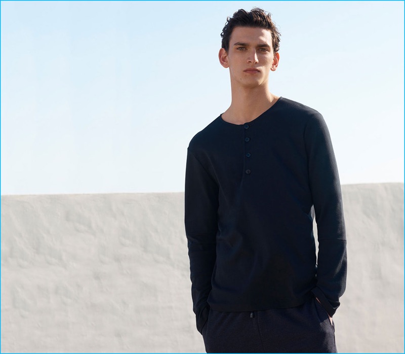 Simon Chilvers outfits Thibaud Charon in a henley and track pants from Helbers.