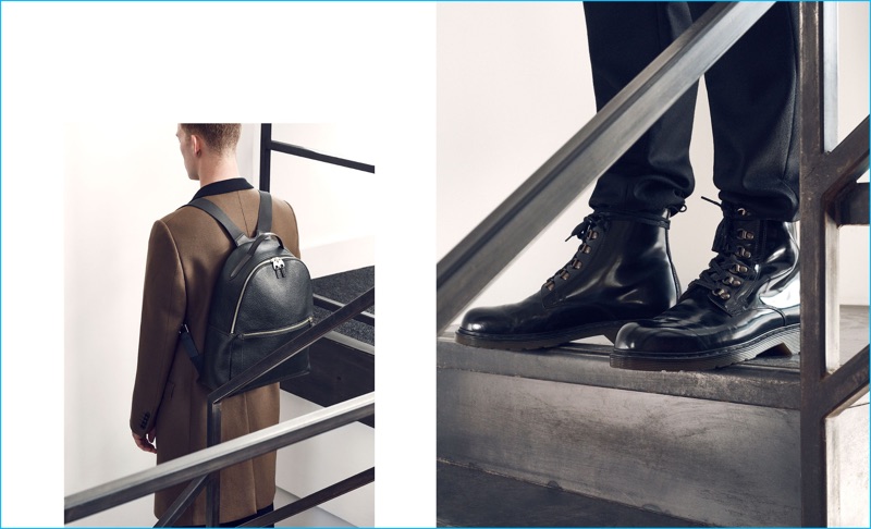 Wearing choice leather footwear and accessories for the season, Bastian Thiery models a Burlington backpack by Smythson and lace-up Ami leather boots with Acne Studios drawstring cuff flannel wool trousers and a Lanvin single-breasted coat from Matches Fashion.
