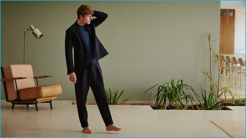 Swedish brand COS serves up sleek styles with a blue slim-fit wool blazer, stretch cotton-blend jersey sweatshirt, and pleated wool trousers.