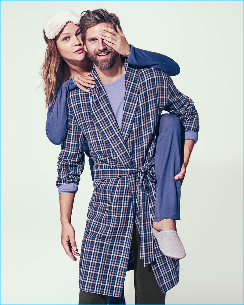 All smiles, RJ Rogenski wears a plaid robe from Hanro for Neiman Marcus' 2016 Christmas Book.