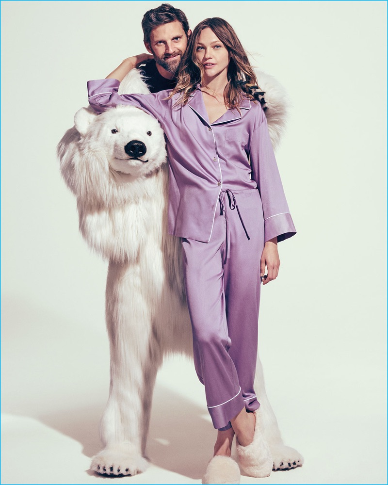 Models RJ Rogenski and Sasha Pivovarova provide a charming allure for Neiman Marcus' 2016 Christmas Book.