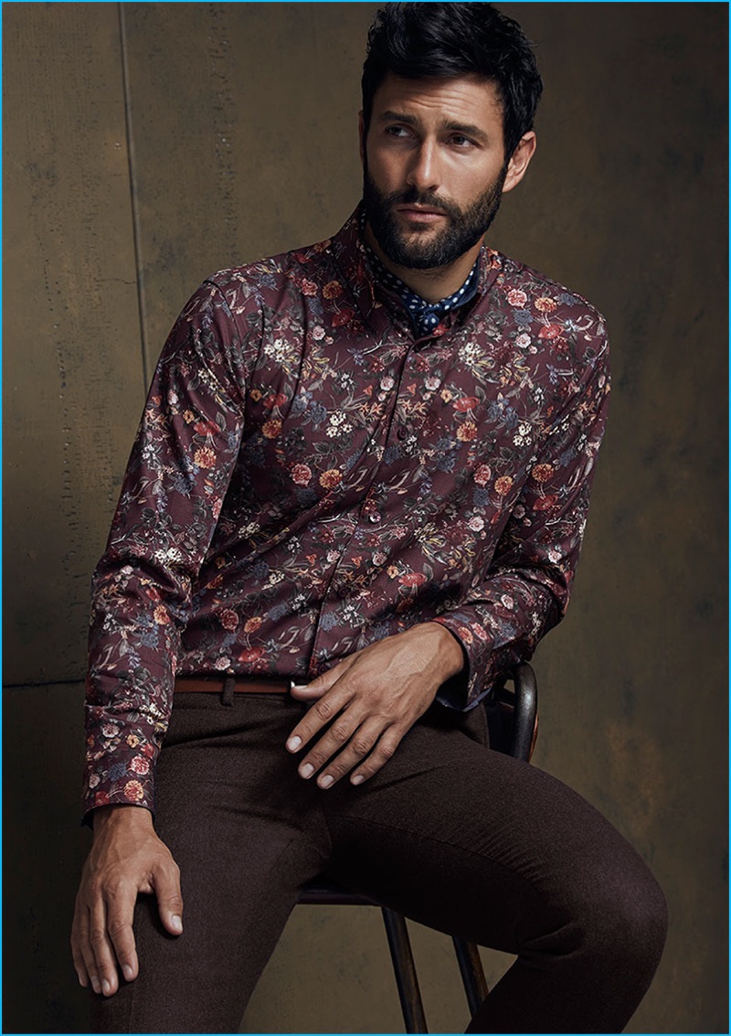 Tapping into the floral trend, Noah Mills wears a patterned shirt with trousers from Simons for the retailer's latest lookbook.