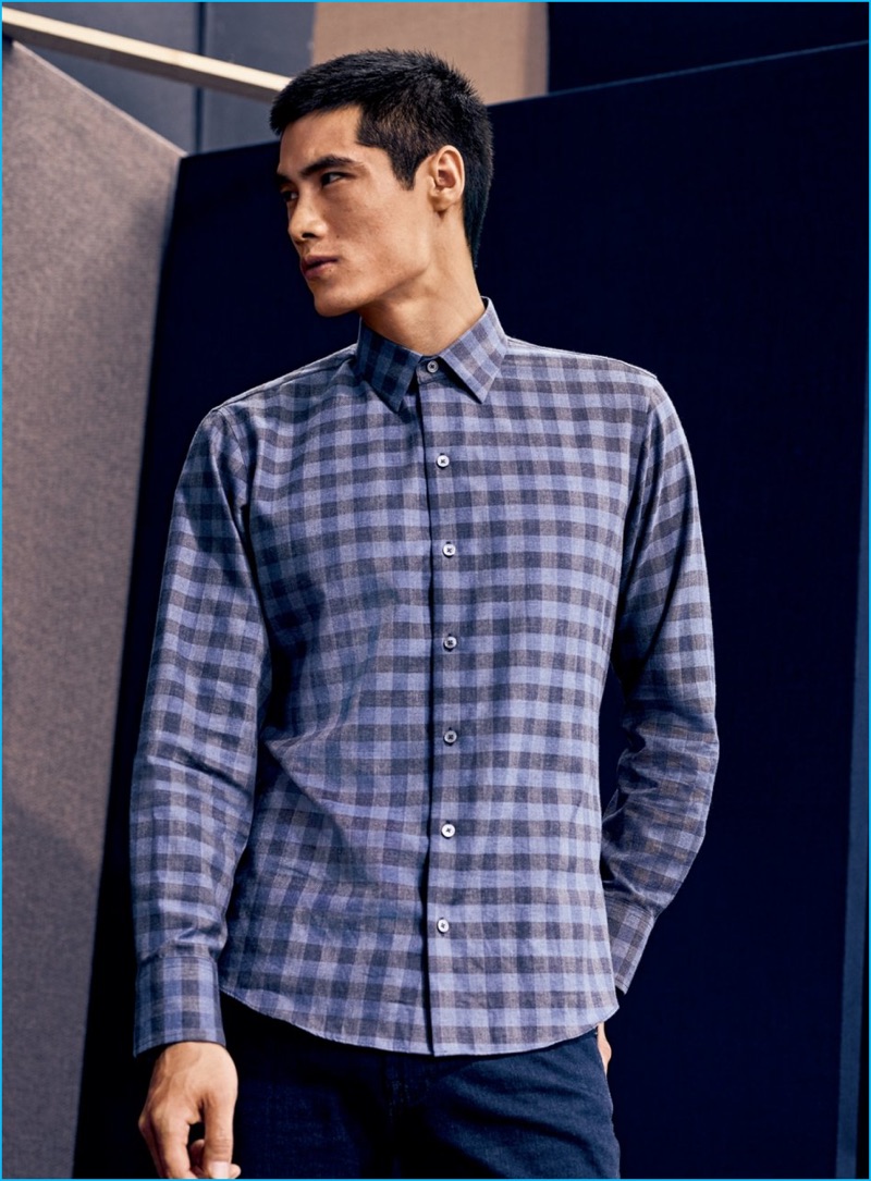 Hao Yun Xiang models relaxed staples, which include a plaid Zachary Prell shirt and AG denim jeans.