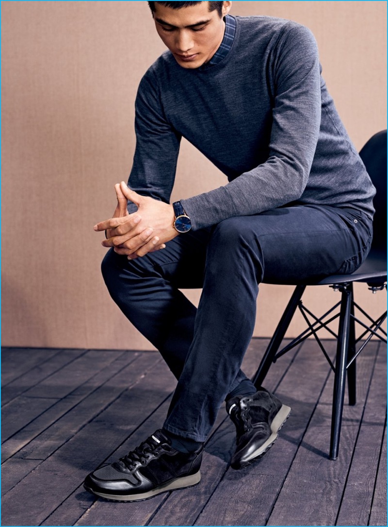Hao Yun Xiang connects with Nordstrom, wearing a Zachary Prell shirt, John Smedley wool sweater, AG denim jeans, and ECCO sneakers.