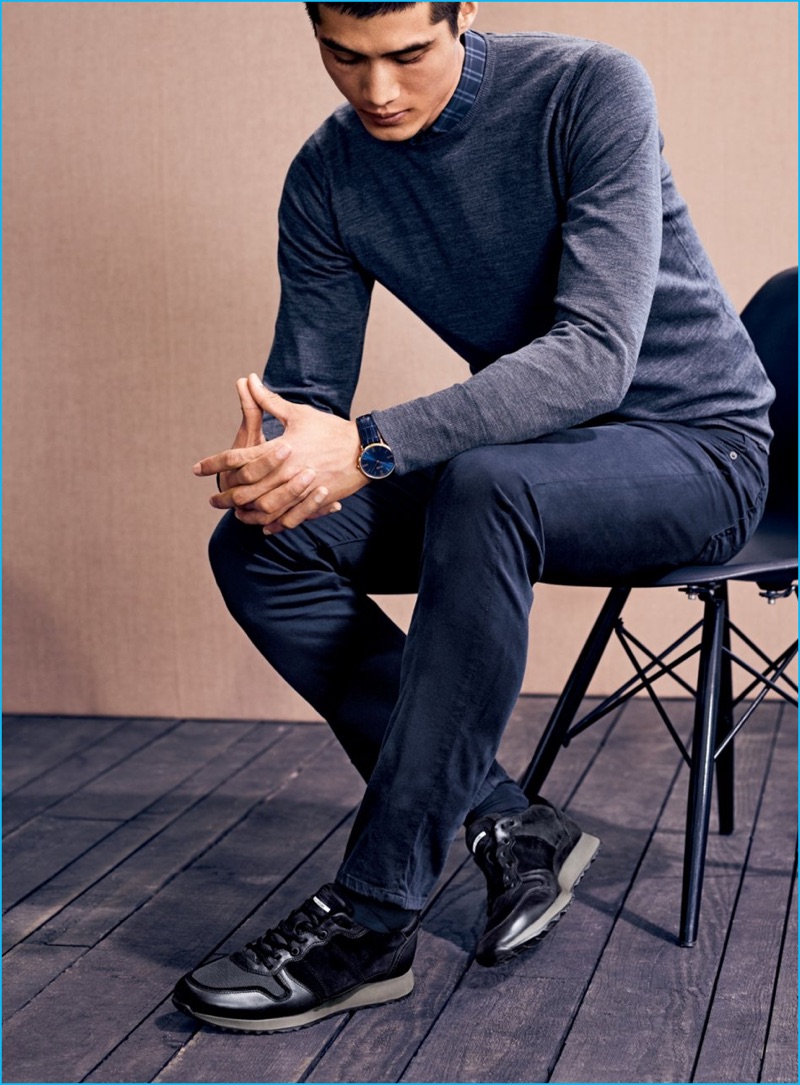 Hao Yun Xiang connects with Nordstrom, wearing a Zachary Prell shirt, John Smedley wool sweater, AG denim jeans, and ECCO sneakers.