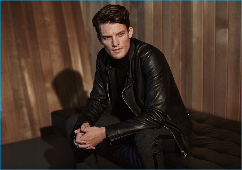 Danny Beauchamp wears a tab collar leather jacket with a black cashmere turtleneck sweater from Reiss' fall-winter 2016 premium collection.