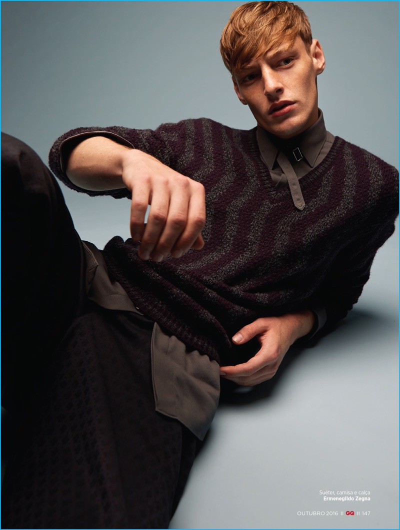 Starring in a fall fashion editorial for GQ Brasil, Roberto Sipos layers in pieces from Ermenegildo Zegna.