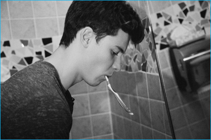 HERO magazine gets candid with Shawn Mendes, who is pictured brushing his teeth.