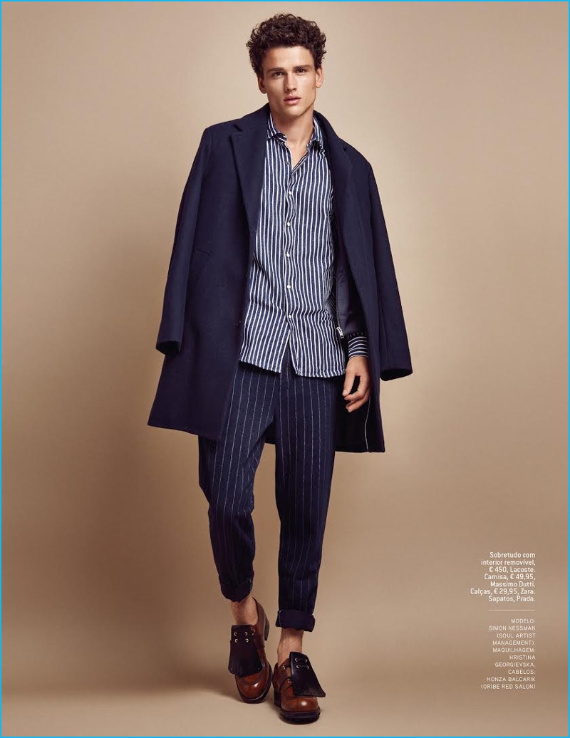 Donning stripes from Massimo Dutti and Zara, Simon Nessman wears a navy coat from Lacoste.