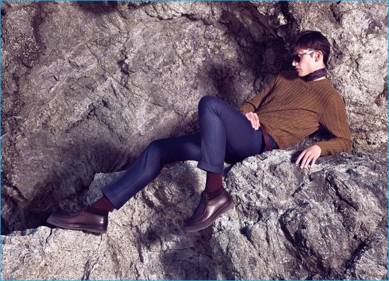 Model Dominik Bauer poses in an autumnal hued look from Ermenegildo Zegna.
