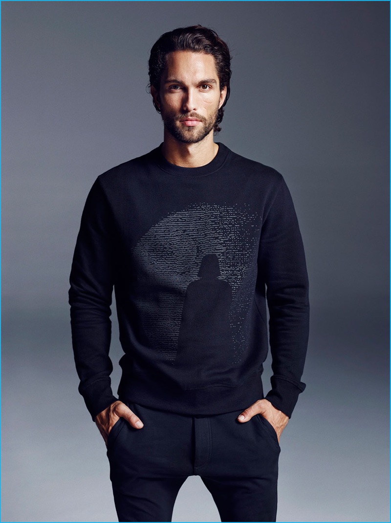 Model Tobias Sørensen wears a Darth Vader inspired sweatshirt for Reserved's winter 2016 lookbook.