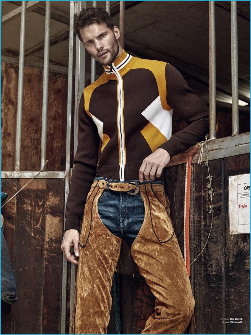 Donning chaps, Tomas Skoloudik wears a Neil Barrett knit track jacket with Dsquared2 distressed denim jeans.