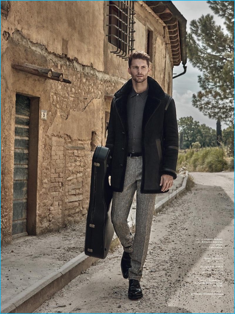Front and center, Tomas Skoloudik wears an Emporio Armani shearling coat, Diesel shirt, Ermanno Scervino trousers, and Calvin Klein shoes.
