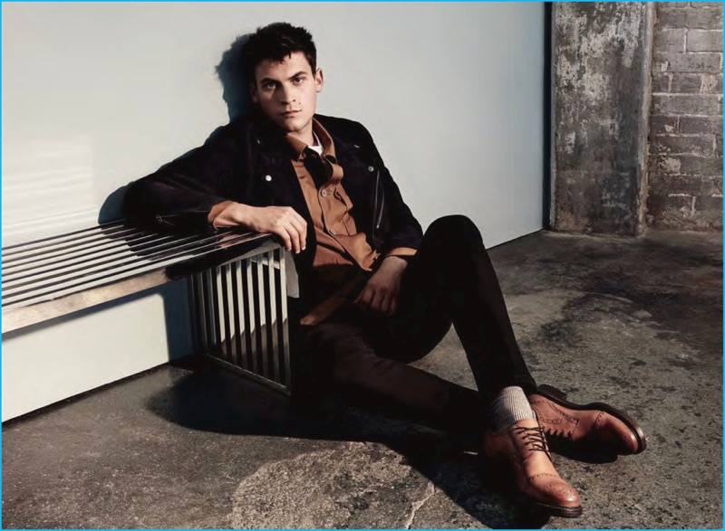 Model Miles Garber relaxes in a pair of brown leather oxfords from Vagabond.