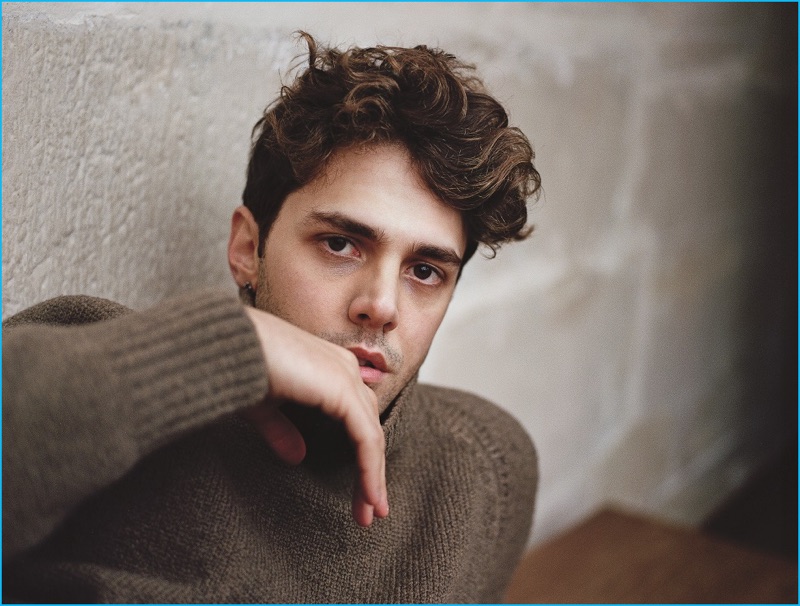 Xavier Dolan dons a brown fall sweater for his August Man Malaysia photo shoot.
