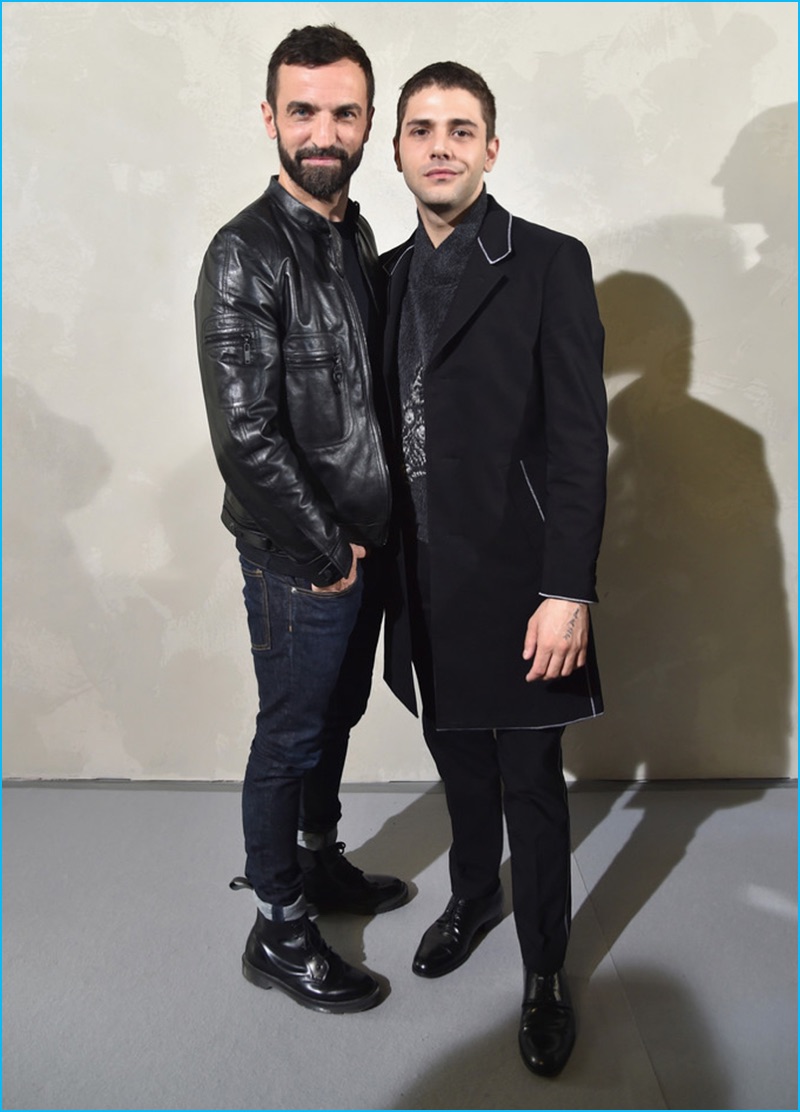 Xavier Dolan poses for pictures with Louis Vuitton creative director, Nicolas Ghesquiere.