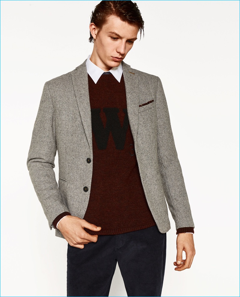 Finnlay Davis wears a blazer with elbow patches from Zara Man's College League collection.