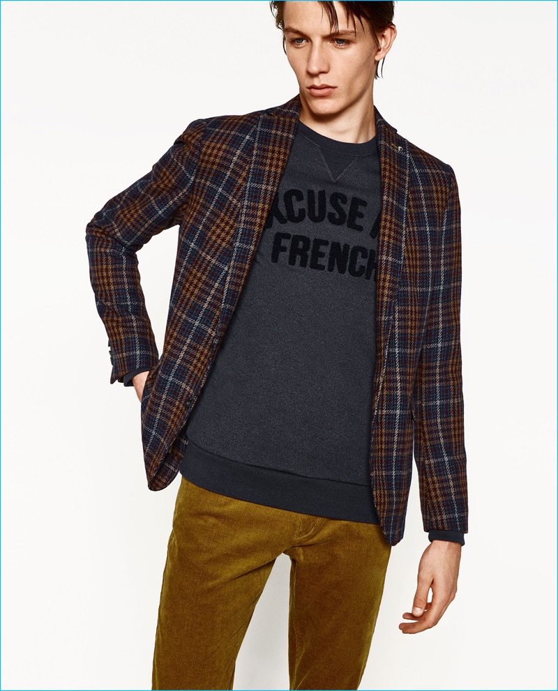 Zara Man goes preppy as Finnlay Davis sports a check wool blazer from its College League collection.